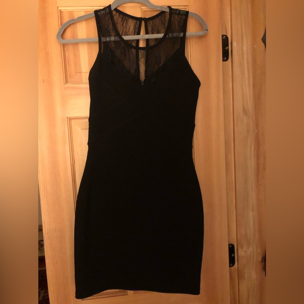 Women’s short black dress. Stretchy and sexy